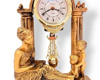 Brass Windsor Clock With Woman Reading To Children With Birds