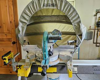 Mitre saw with hood and stand