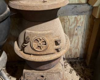 Cast iron goods including pot belly stove