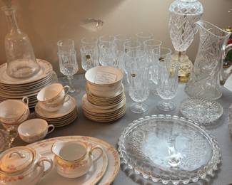Pair of crystal lamps and lots of crystal glasses