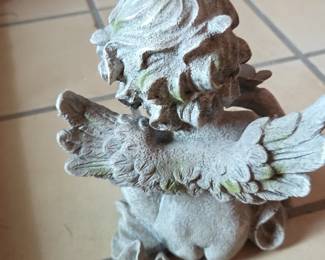 Cherub Holding Butterfly Statue second image