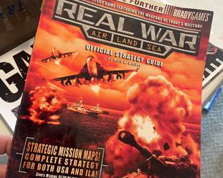 COLLECTIBLE  "REAL WAR" GAME BOOK 