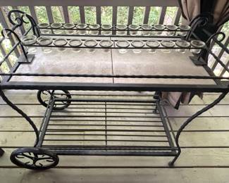 BUY IT NOW! $150.00. Tile top patio cart. 20" D x 49" W x 37 1/2" H. Call Jan at 314 960-5700.