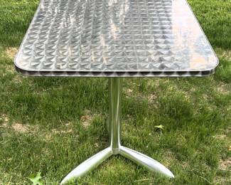 BUY IT NOW! $150.00. Stainless Steel Circle Swirl Textured Surface Cafe Pedestal Table (Alutec Spain). Call Jan at 314 960-5700.