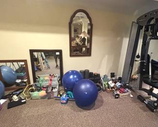 Variety of exercise equipment, Hoist weight lifting system.