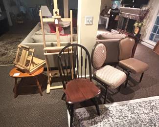 Chairs and artist easels.