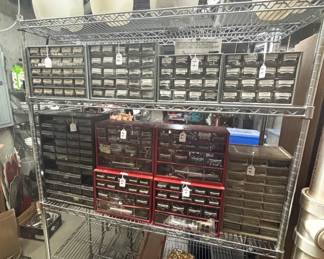Wire shelf, multi drawer cabinets for screws and small parts.