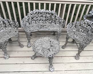  Four piece heavy aluminum patio set.