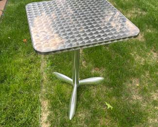 BUY IT NOW! $150.00. Stainless Steel Circle Swirl Textured Surface Cafe Pedestal Table (Alutec Spain). Call Jan at 314 960-5700.