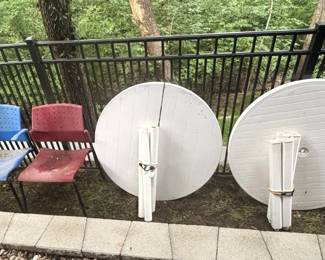 Chairs and round plastic 4 leg tables.