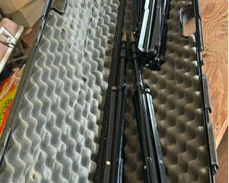 Lot 127: Telescoping metal rods and signaling rope gear in a hard case