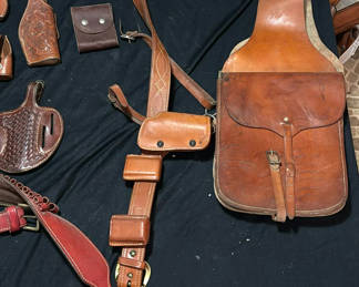 Lot 169: Assorted brown leather belts, holsters, and pouches