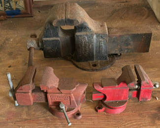 Lot 117: Bench Vise Set: One Large Black Vise and Two Red Vises