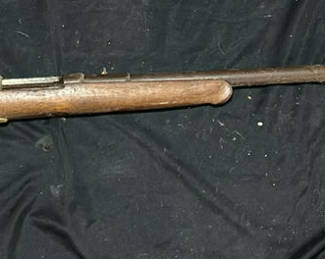 Lot 166: Rifle with wooden stock and mounted scope