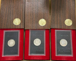 Lot 53: Three Eisenhower dollar proof coin sets in presentation boxes