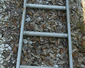 Lot 62: Ladder, Traffic Cone, Toolbox, and Lumber