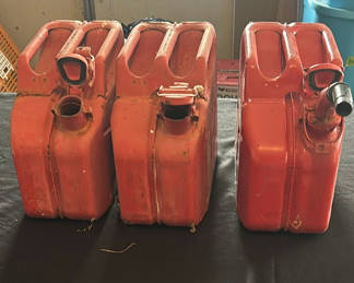 Lot 109: Three Metal plastic gas cans