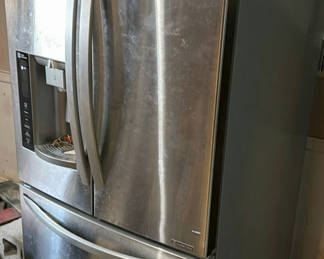 Lot 24: LG stainless steel French-door refrigerator with bottom freezer