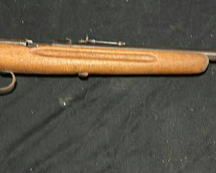 Lot 164: Vintage bolt-action rifle with wooden stock