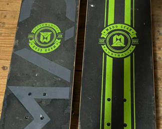 Lot 31: 2 Madd Gear skateboards with monster and dinosaur graphics