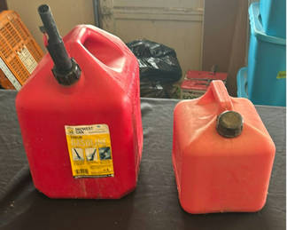 Lot 110: Two red gasoline cans
