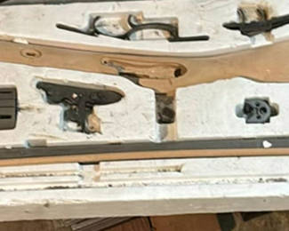 Lot 170: Disassembled firearm parts with wooden stocks and metal components