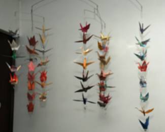 MOBILE OF FOLDED BIRDS BY ZABBY COX