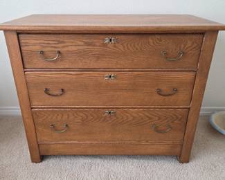 Lot #176 - Antique Wooden Dresser with Brass Hardware and Solid Wood Construction