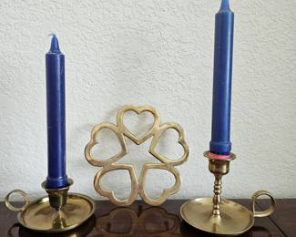 Lot #98 - Vintage Brass Chamberstick Candlesticks with Blue Taper Candles and Brass Trivet