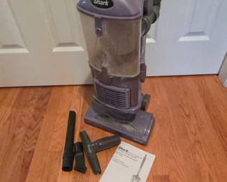 Lot #196 - Shark Navigator NV350 Lift-Away Upright Vacuum with Swivel Steering and Accessories