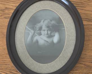 Lot #165 - Antique M.B. Parkinson 1897 'Cupid Awake' Vintage Print Oval Wall Art in Black Frame