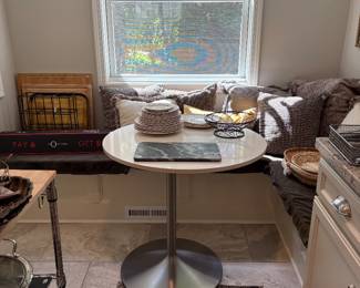 Down Pillow Galore.  Quartz top cafe table
