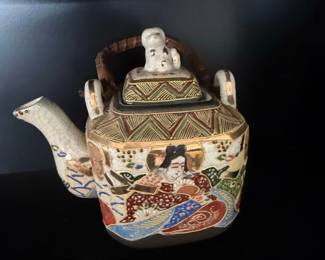 Japanese Porcelain Teapot with Figural Decoration