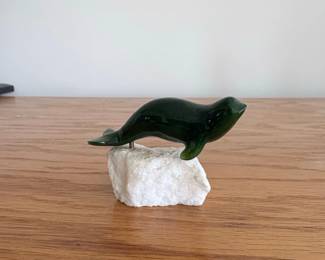 Carved Green Stone Seal Figurine on Rock Base