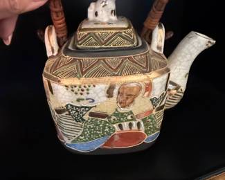 Japanese Porcelain Teapot with Figural Decoration second image