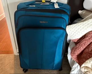 American Tourister Odyssey Teal Expandable Spinner Luggage