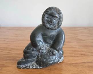 Inuit Carving of a Hunter with Seal by Tivi Etok