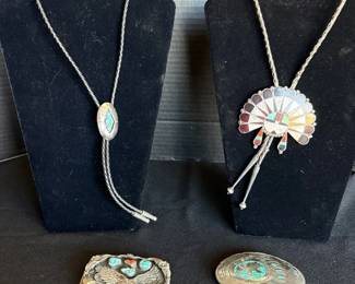 A Couple Bolo Ties And A Couple Belt Buckles