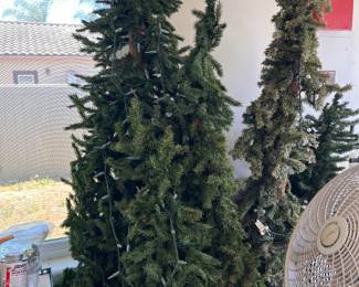 many Christmas tree trees and holiday decor