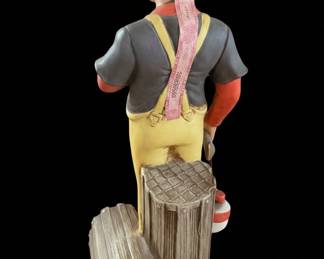 Ceramic Figurine of a Fisherman Smoking a Pipe