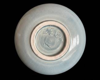 light blue ceramic bowl with crazing