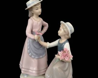 Lladro Porcelain Figurines: Cinderella, Girl with Teddy Bear, Two Girls with Flowers, and Dancer