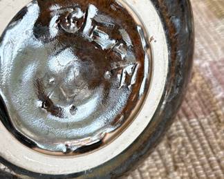 pottery bowl with deep brown glaze 