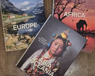 Taschen National Geographic 3 book series includes Europe, Africa and Asia Oceania.  Each featuring the amazing photography that Nat Geo is known for! 