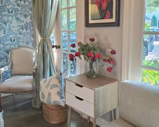 large selection of occasional tables, baskets, pillows and other decor