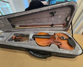 Violin with bow in carrying case - violin labeled "Eastar"