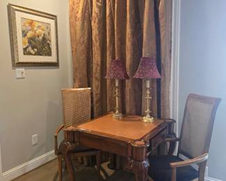 Queen Anne style burl wood leather tip game table with ball & claw feet, two wicker backed arm chairs, heavy, sunblocking/insulating custom curtains