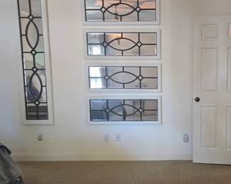 heavy, framed decorative mirrors used to create the illusion of transom windows but they are pretty as wall art too!