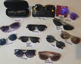 Large variety of name brand sunglasses with names like:  Ray-ban, Christian Dior, Oakley, Valentino, Oscar DeLaRenta, Hilfiger, Rickman, Garrett Leight, Fendi, Anne Klein & more