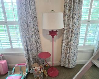 pink floor lamp with side table